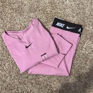 Brand new pink Nike outfit. Size medium top+bottom